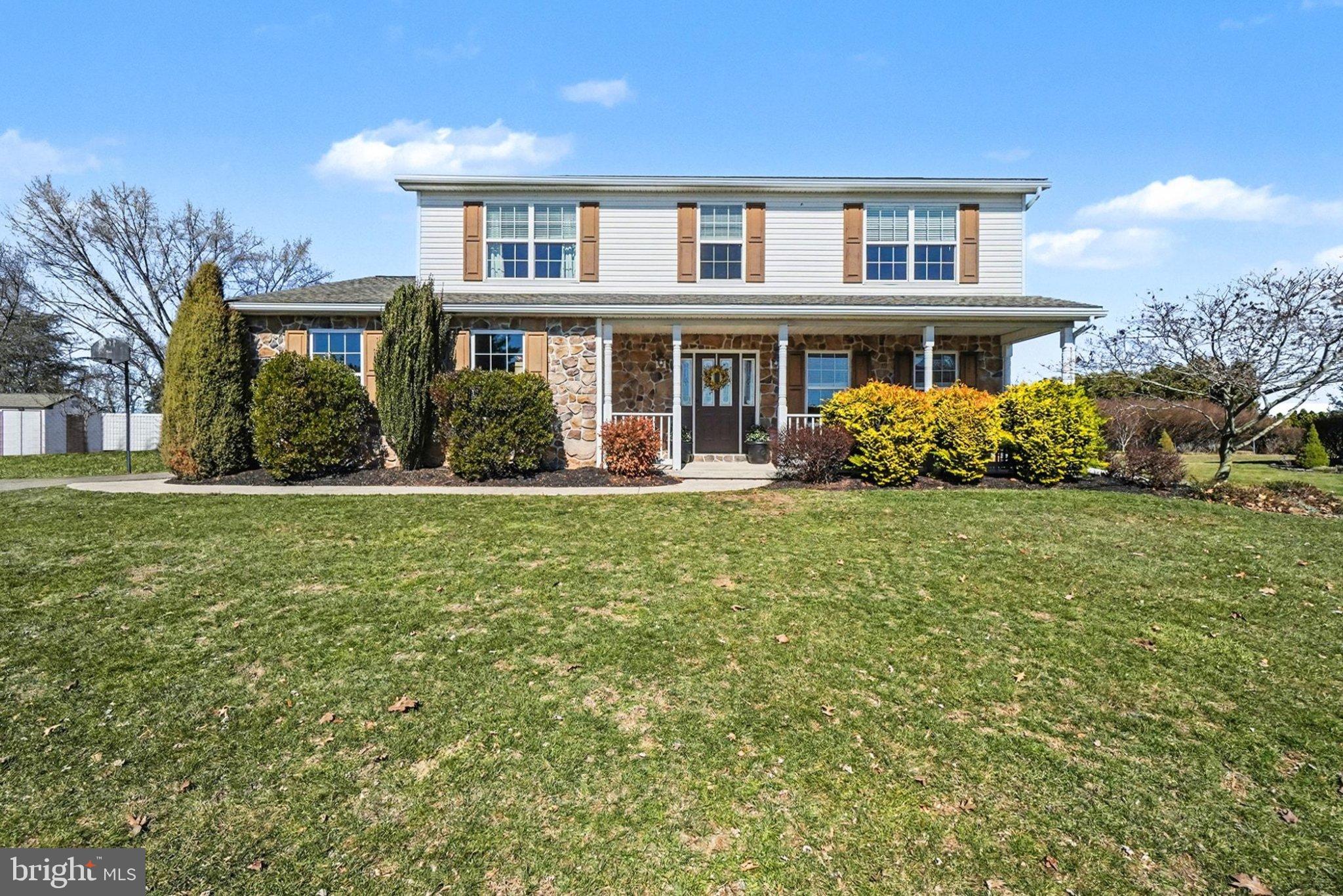 44 Oak Avenue Halifax, PA 17032 - Photo 2 of 33 a front view of a house with a yard