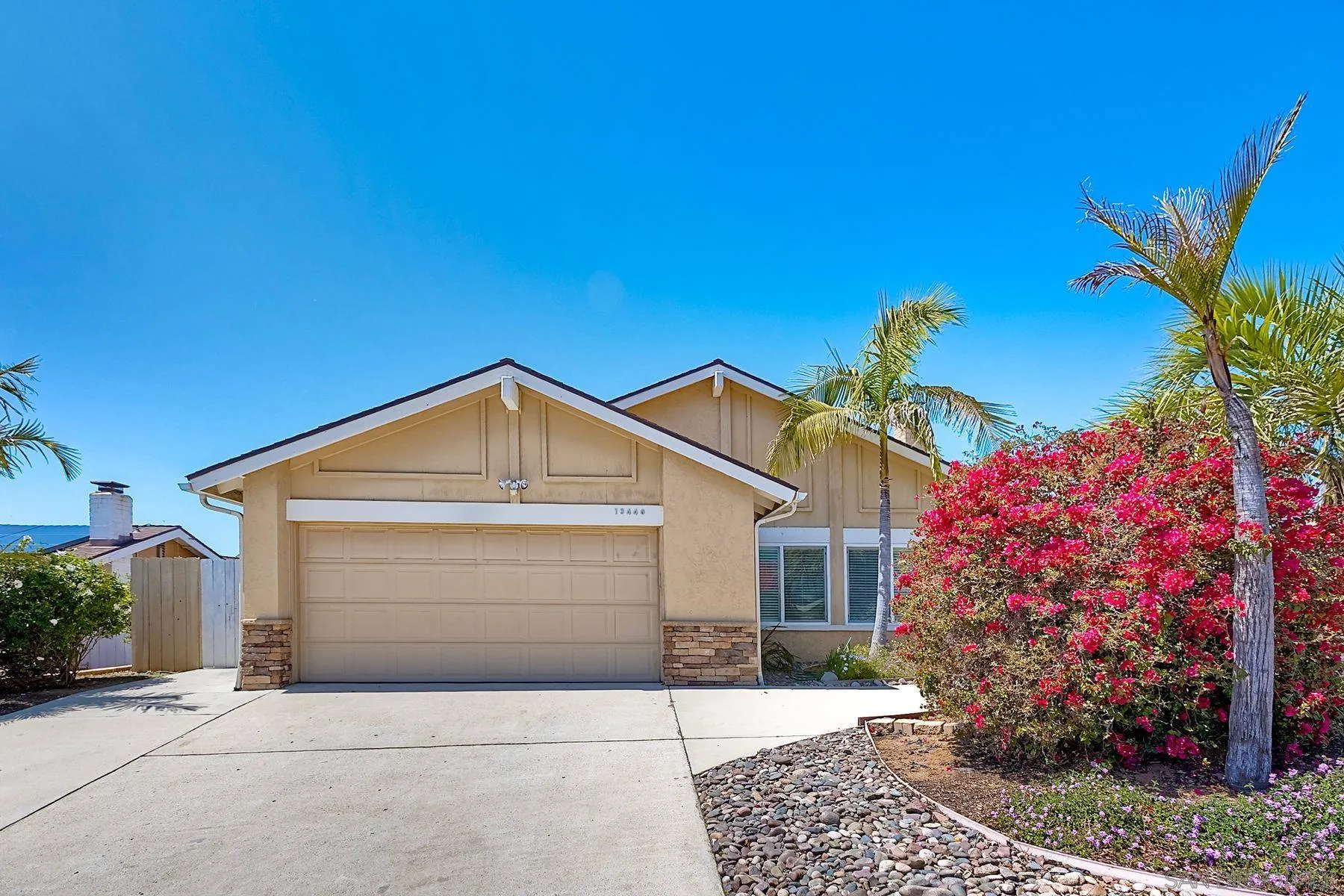 13440 Montego Drive Poway, CA 92064 - Photo 1 of 35 a front view of a house with a garage