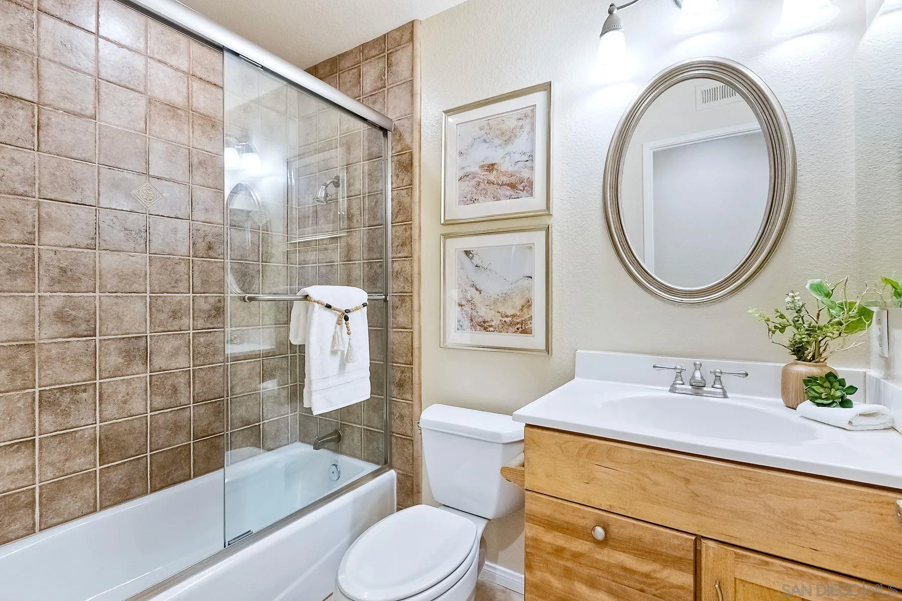 13440 Montego Drive Poway, CA 92064 - Photo 21 of 35 a bathroom with a sink a toilet and shower