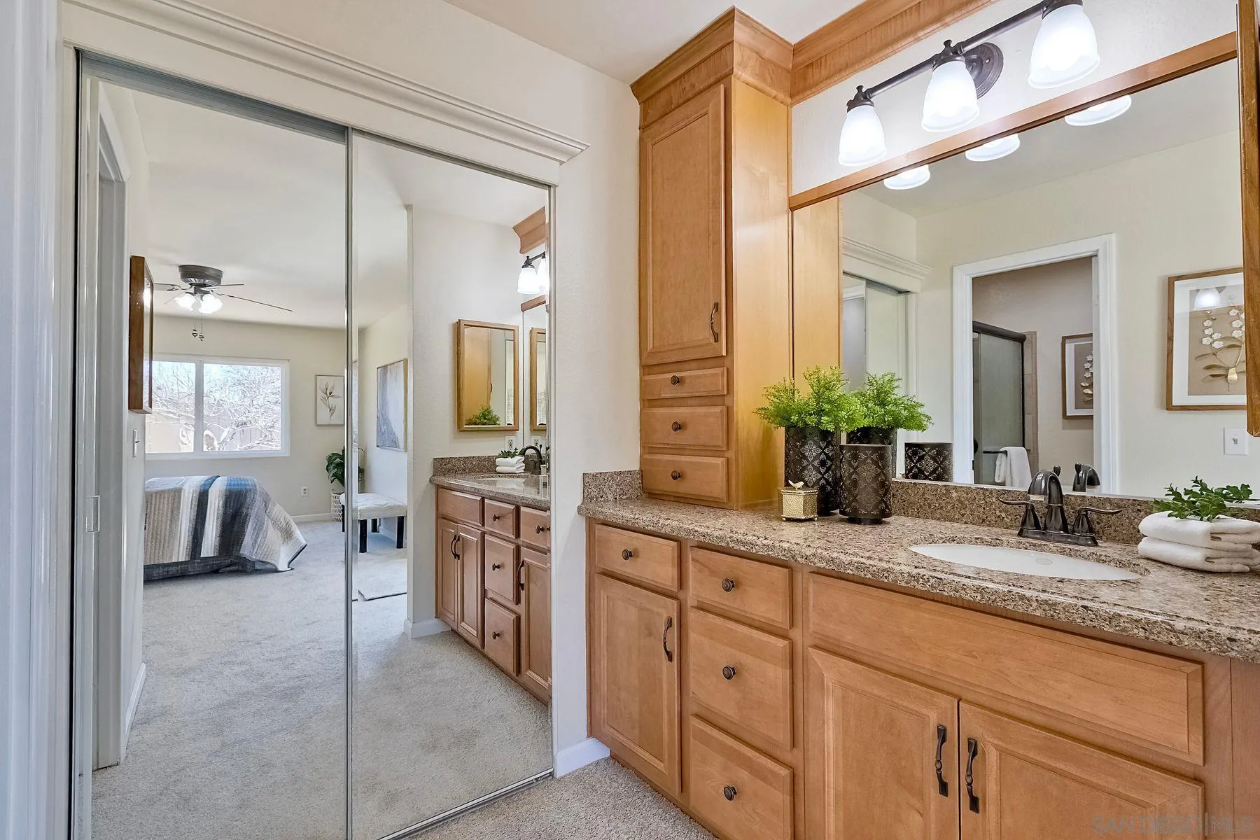 13440 Montego Drive Poway, CA 92064 - Photo 27 of 35 a spacious en suite bathroom with double sink and a large mirror