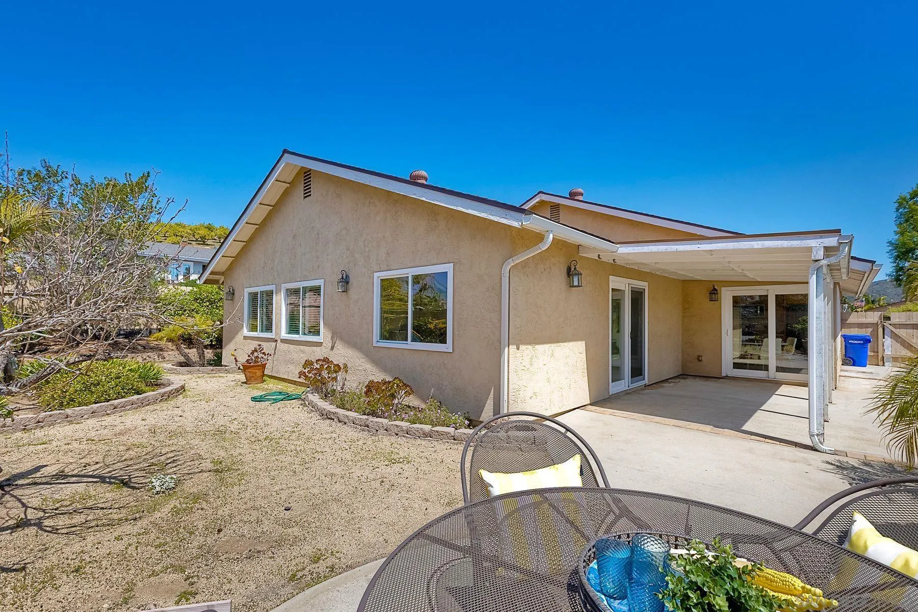 13440 Montego Drive Poway, CA 92064 - Photo 32 of 35 a view of a house with backyard and sitting area