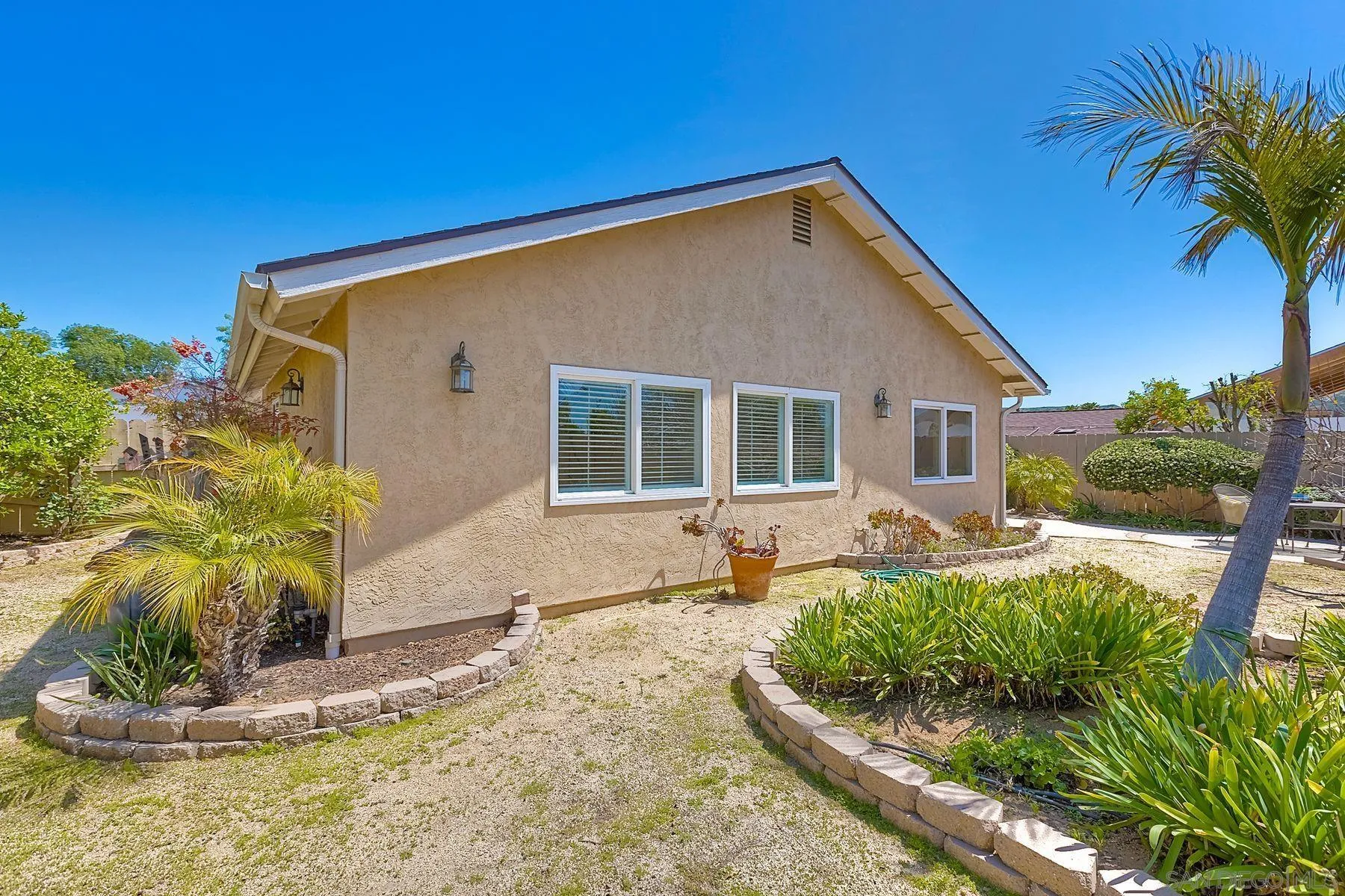 13440 Montego Drive Poway, CA 92064 - Photo 33 of 35 a front view of house with yard outdoor seating and entertaining space