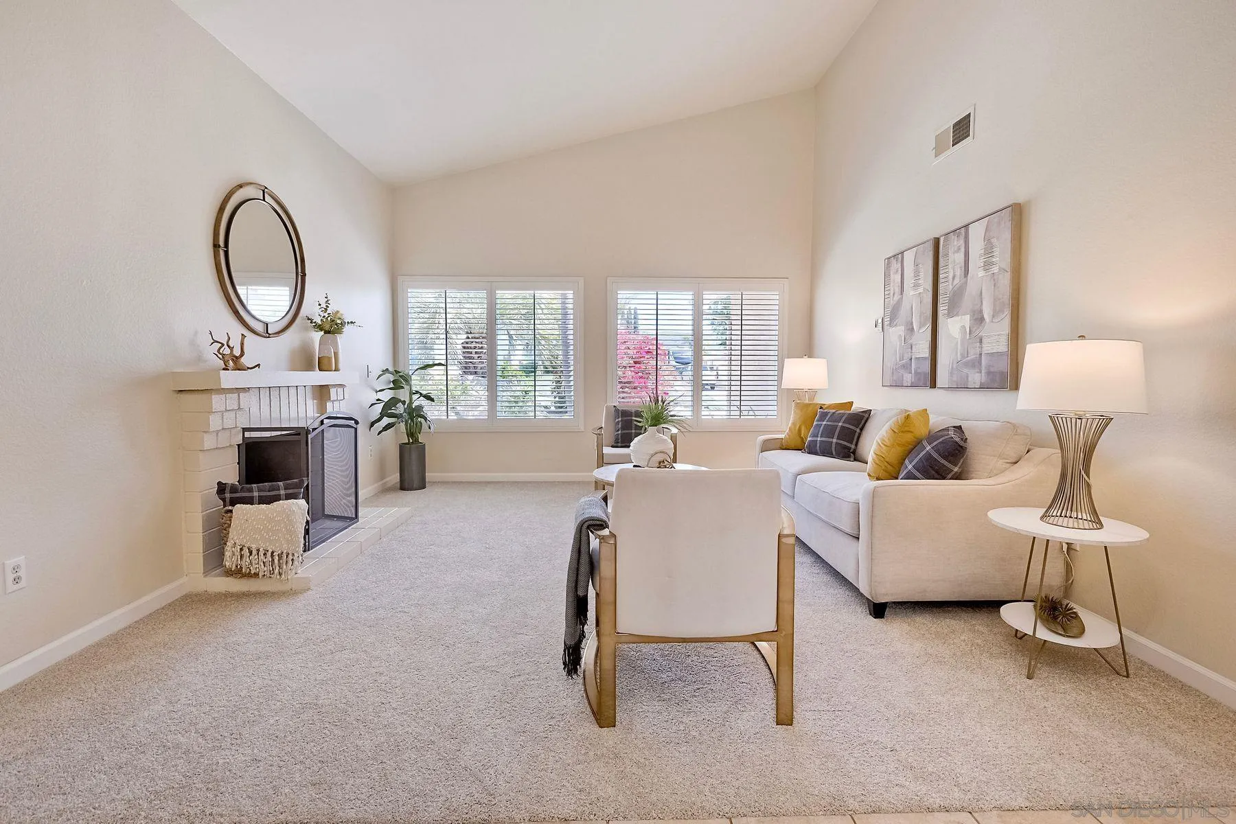 13440 Montego Drive Poway, CA 92064 - Photo 6 of 35 a living room with furniture a fireplace and a window