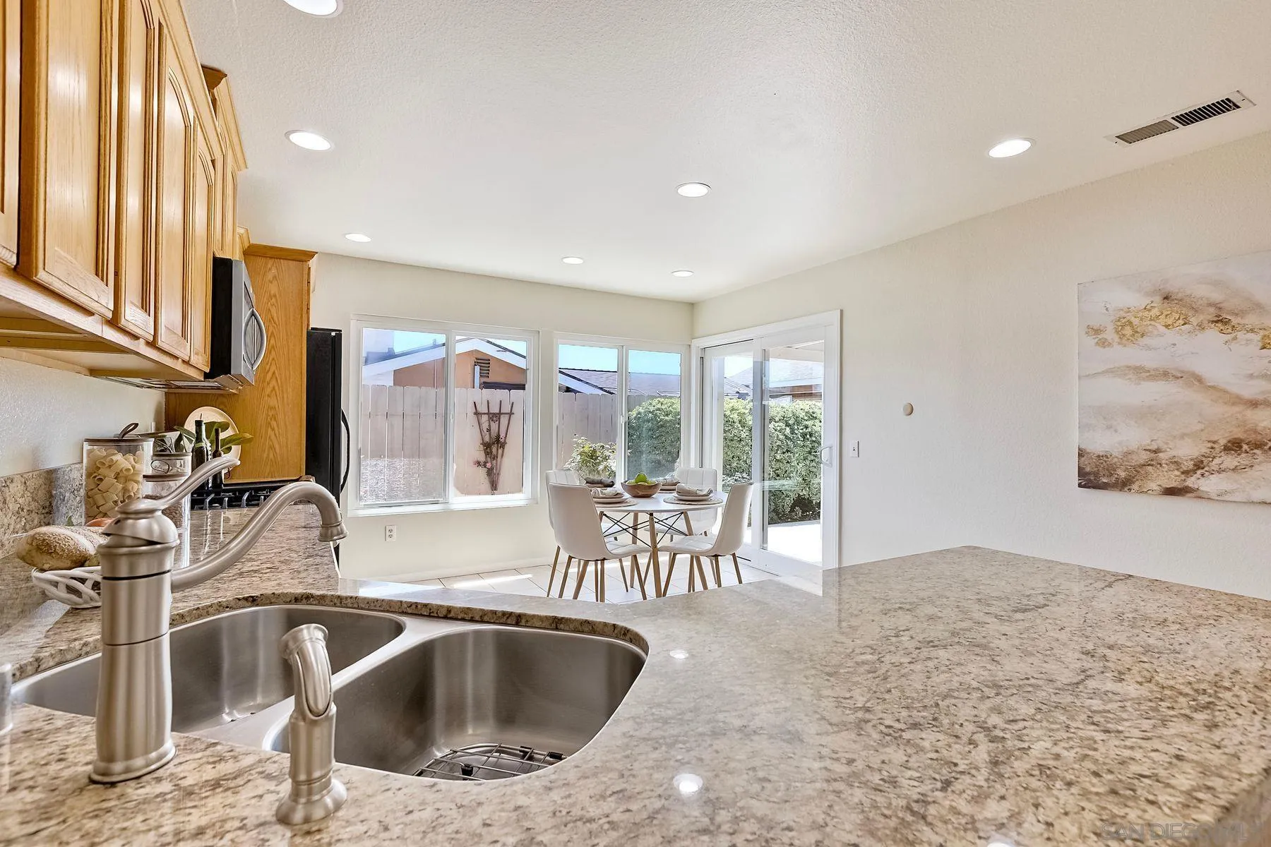 13440 Montego Drive Poway, CA 92064 - Photo 10 of 35 a kitchen with a sink and a large window