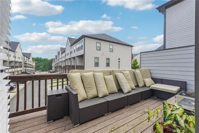 a bathroom with a double vanity sink a mirror and shower