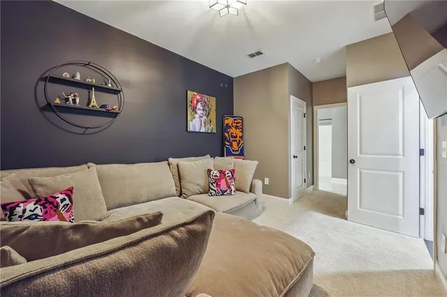 a front view of a building with parking space