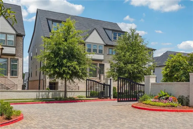 a view of a balcony with furniture