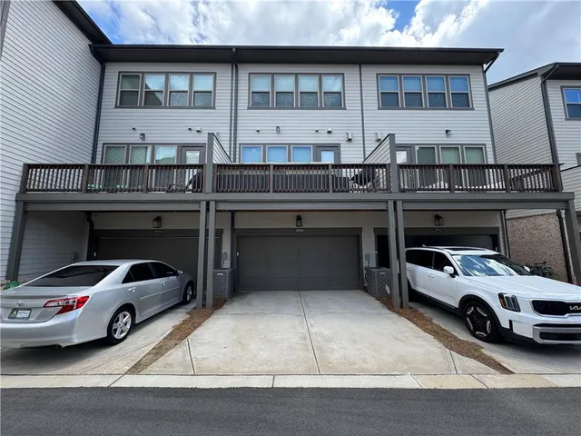a room with gym equipment and a large window