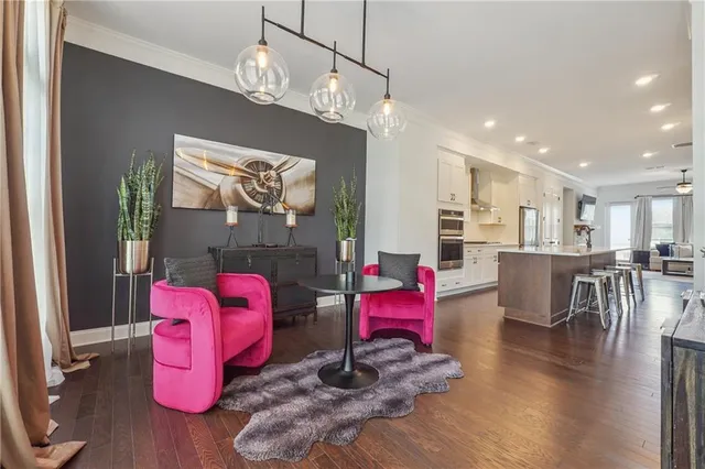 a living room with furniture fireplace and flat screen tv