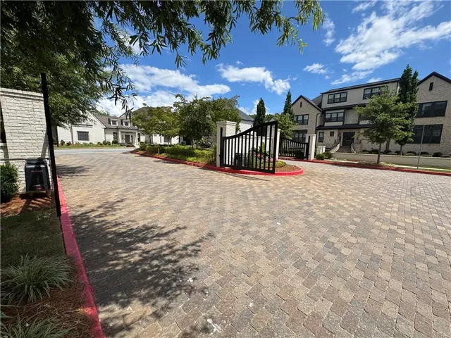 a view of a house with swimming pool yard and patio