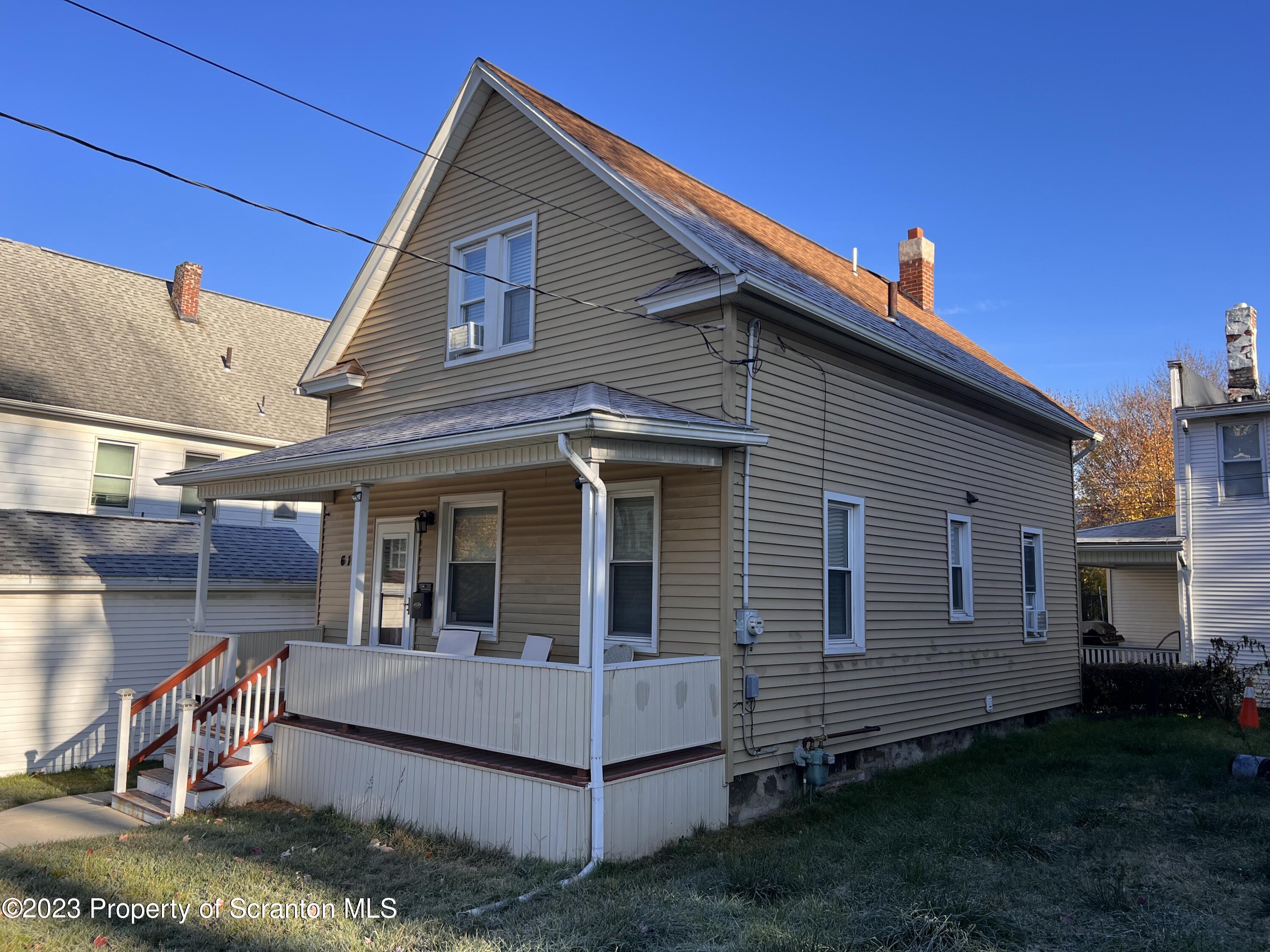 611 East Locust Street Scranton, PA 18505 - Photo 2 of 18 a view of house with a yard