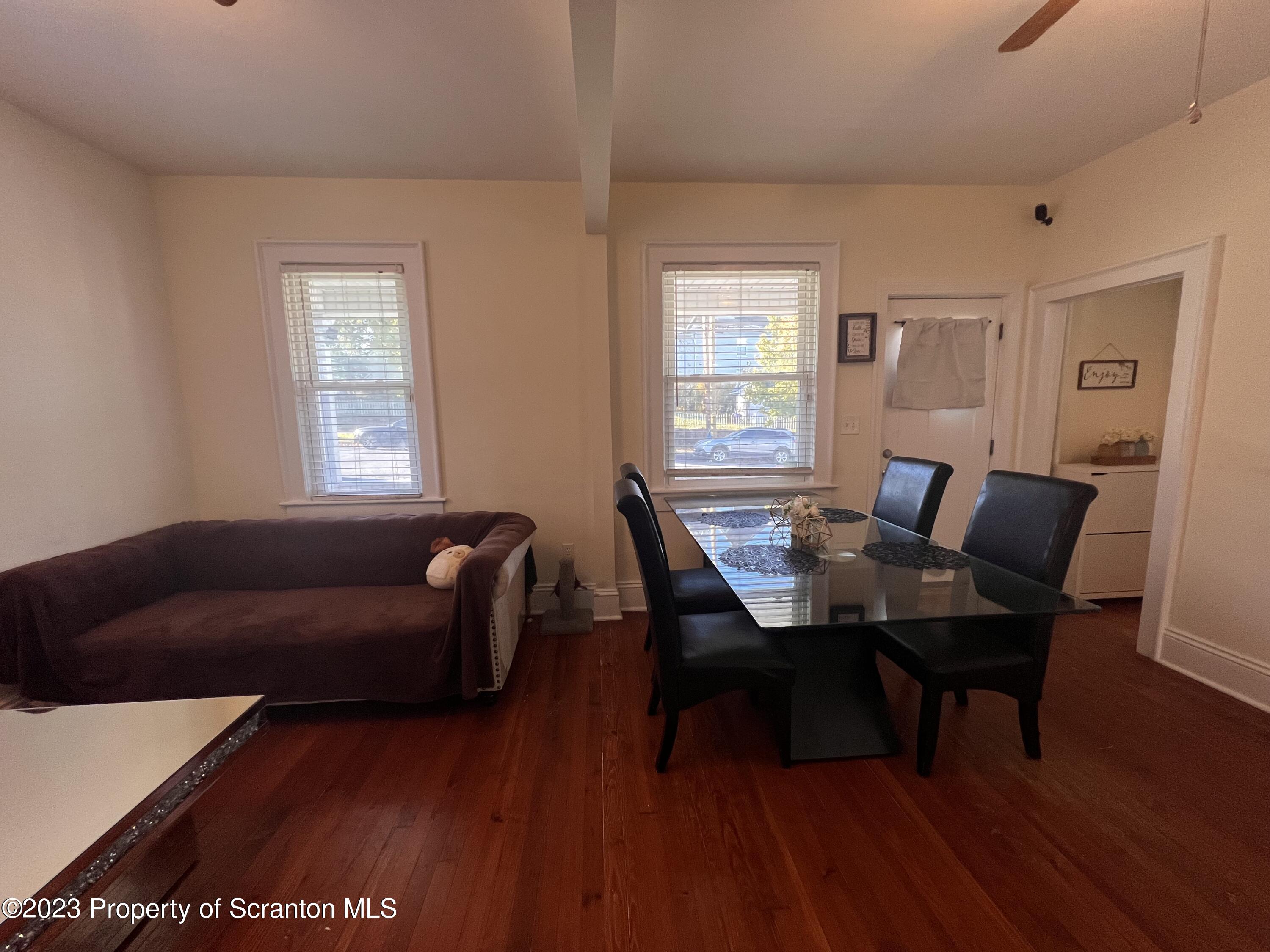 611 East Locust Street Scranton, PA 18505 - Photo 6 of 18 a living room with furniture and a wooden floor