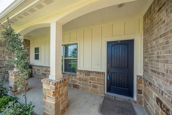 a backyard of a house with garage and garage