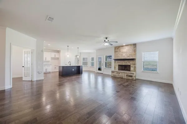 a view of a kitchen with a sink and a kitchen view