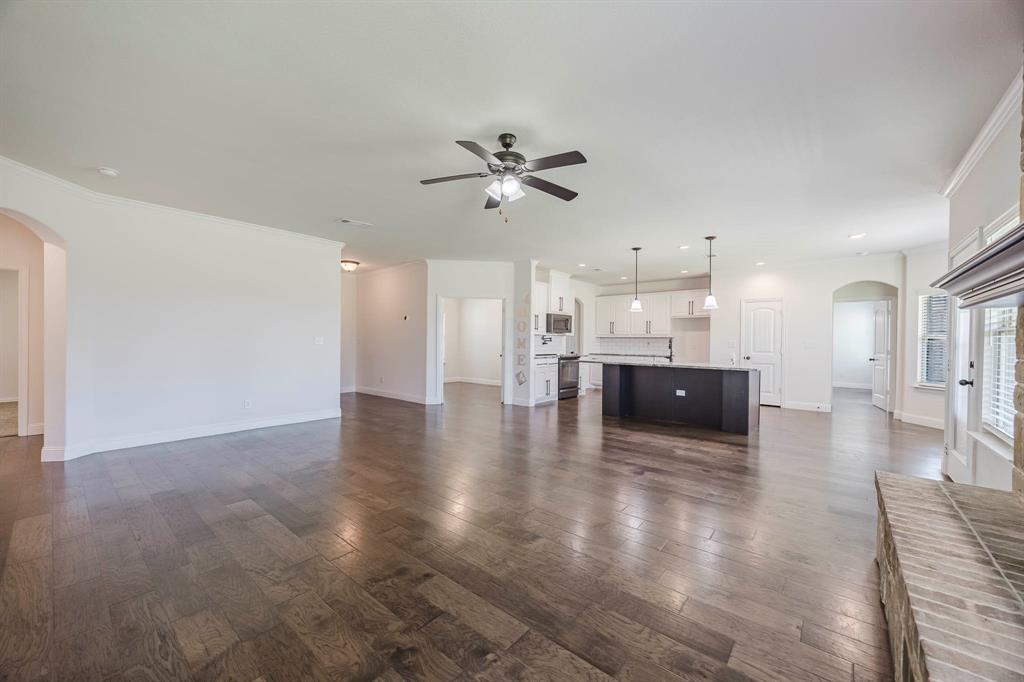 105 Kathy Stephens Avenue Springtown, TX 76082 - Photo 23 of 40 a view of a kitchen with a sink and a kitchen view