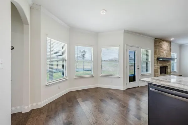 a view of cabinets with granite countertop