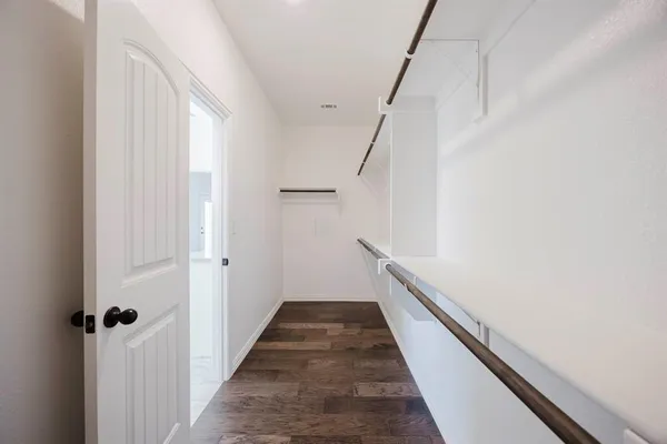 a bathroom with a sink toilet a mirror and shower