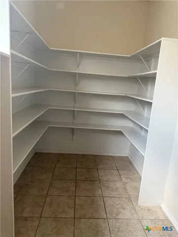 a view of a room with shelves