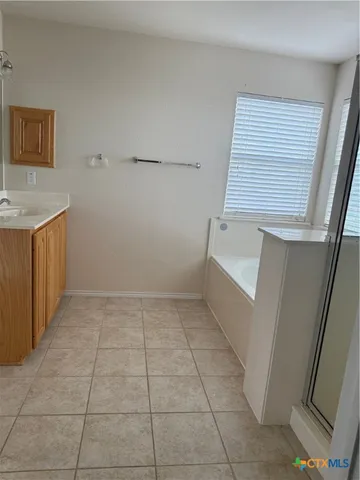 a view of an empty room with stairs