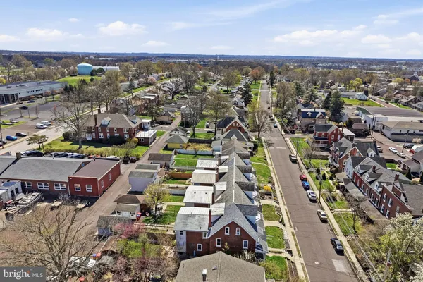 an aerial view of a city with lots of residential buildings