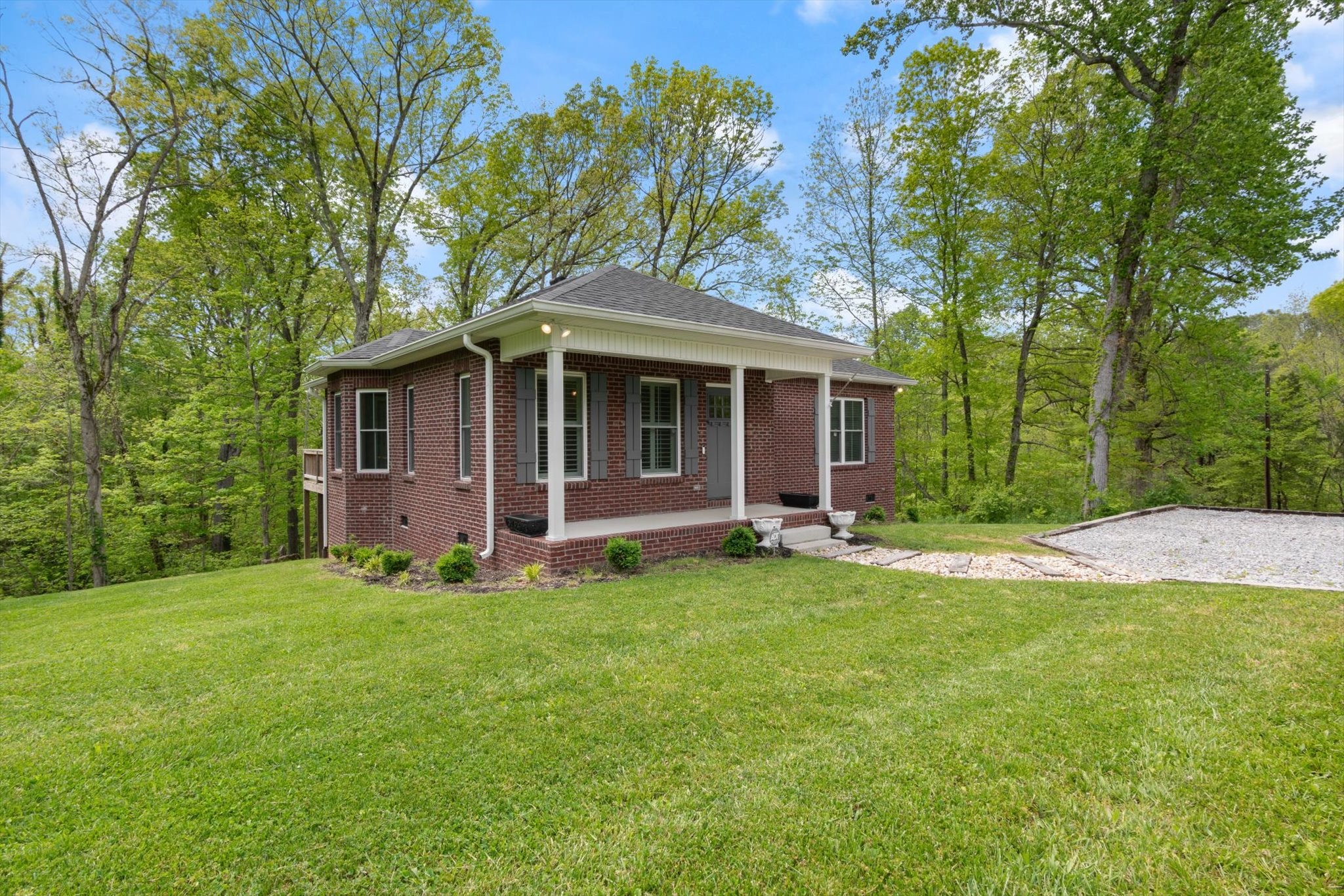 7452 South Swift Road Goodlettsville, TN 37072 - Photo 3 of 27 a view of a house with a yard