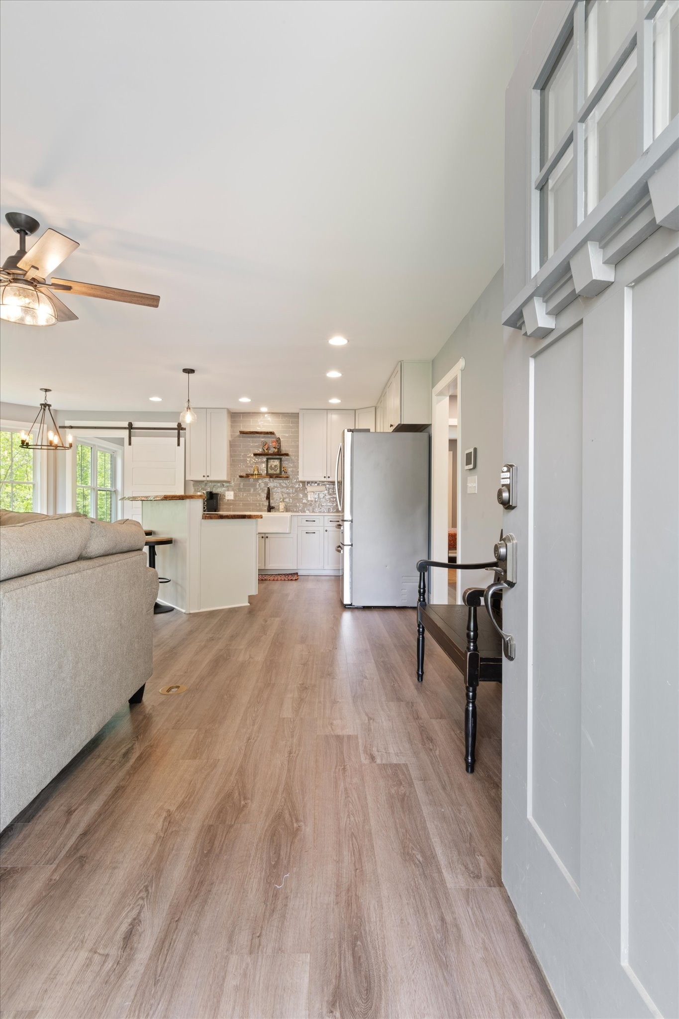 7452 South Swift Road Goodlettsville, TN 37072 - Photo 5 of 27 a view of a kitchen with furniture and wooden floor