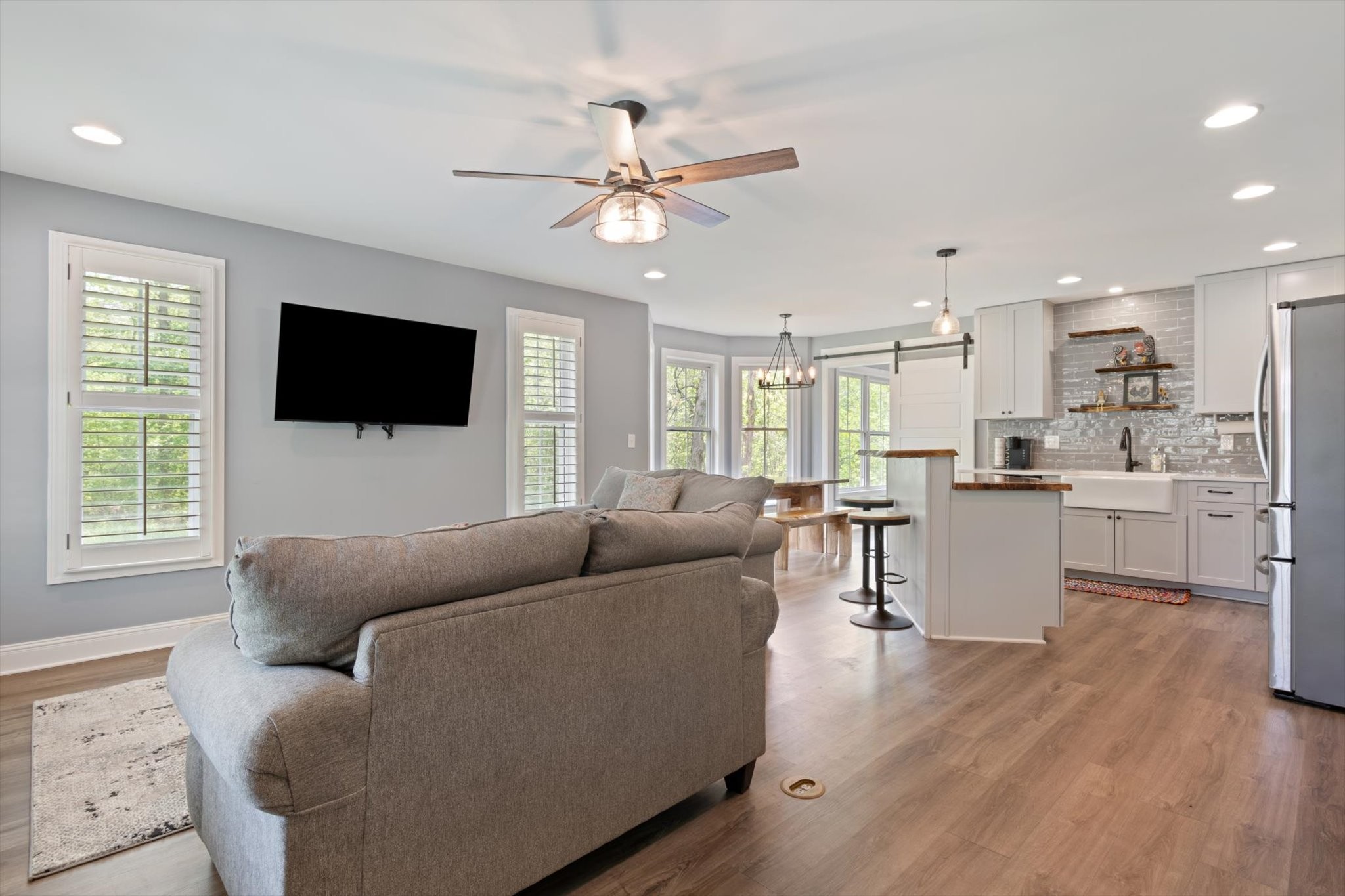 7452 South Swift Road Goodlettsville, TN 37072 - Photo 7 of 27 a living room with furniture and a flat screen tv