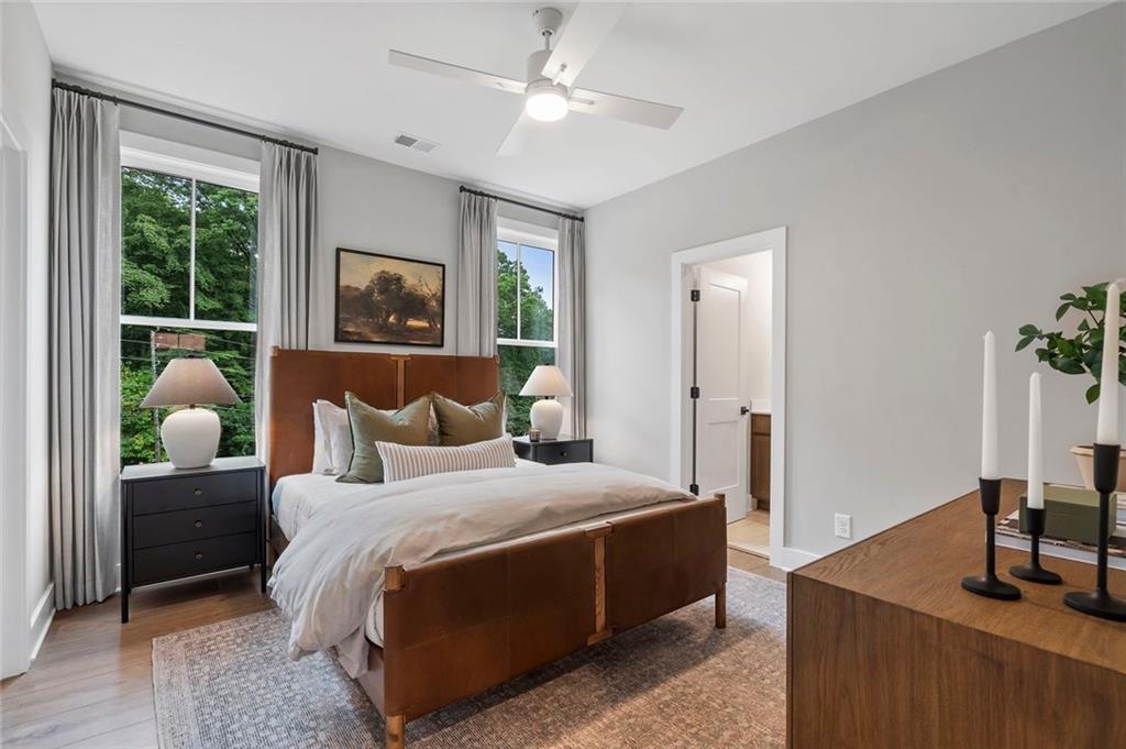 1932 Repose Drive Chamblee, GA 30341 - Photo 17 of 29 a bedroom with a bed and a table