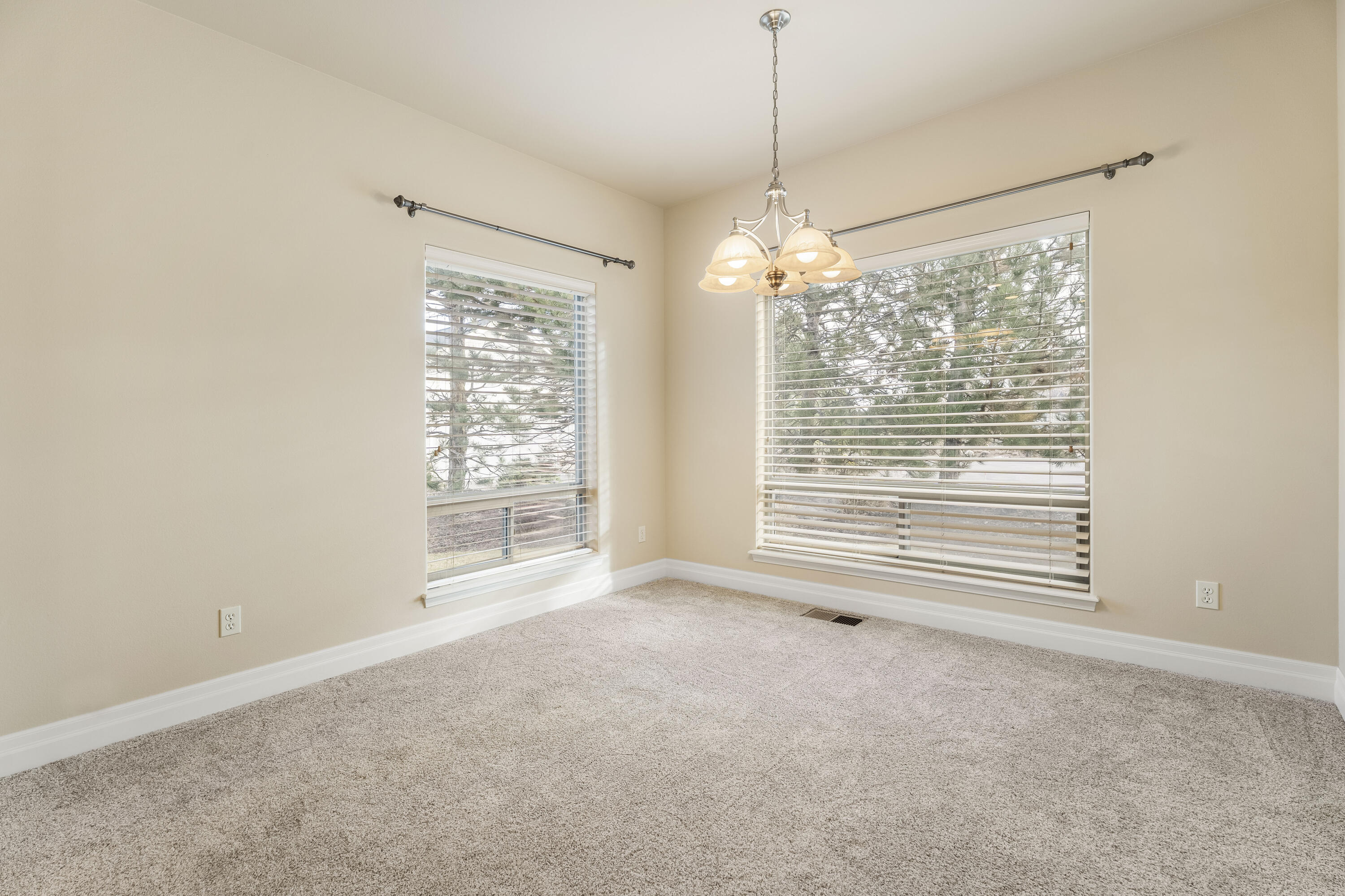 784 Ribbon Falls Road Redmond, OR 97756 - Photo 29 of 79 a view of an empty room with a window
