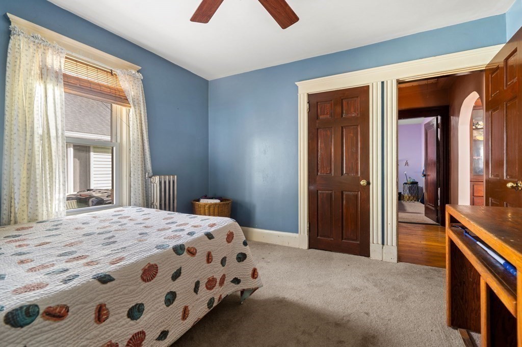 14 Fairview Avenue Peabody, MA 01960 - Photo 21 of 37 a bedroom with a bed and a dresser