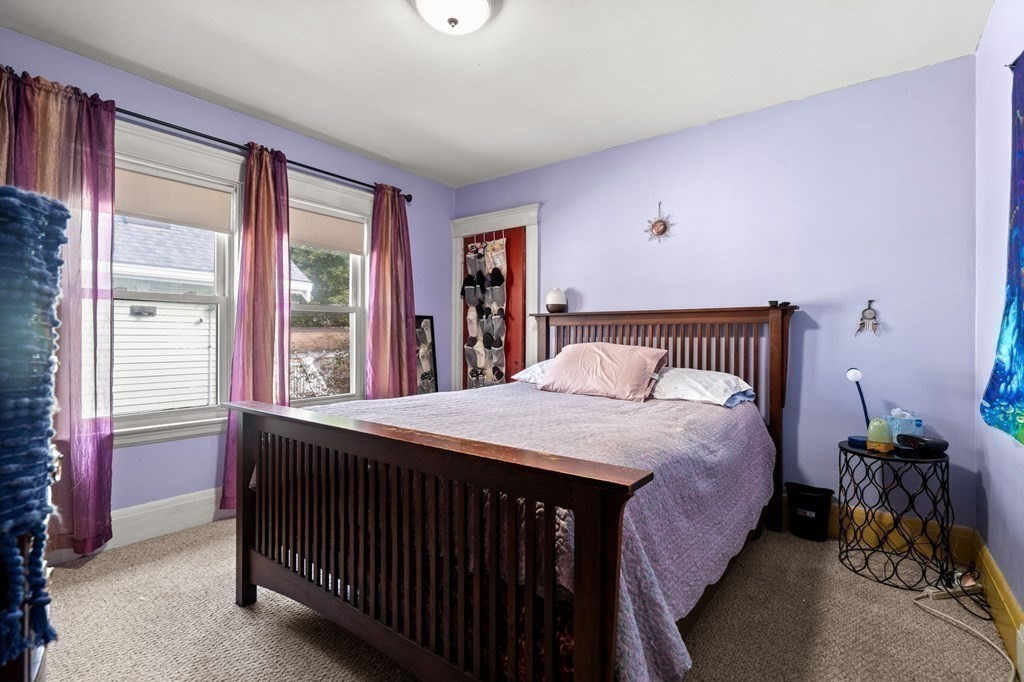14 Fairview Avenue Peabody, MA 01960 - Photo 24 of 37 a bedroom with a bed and a large window