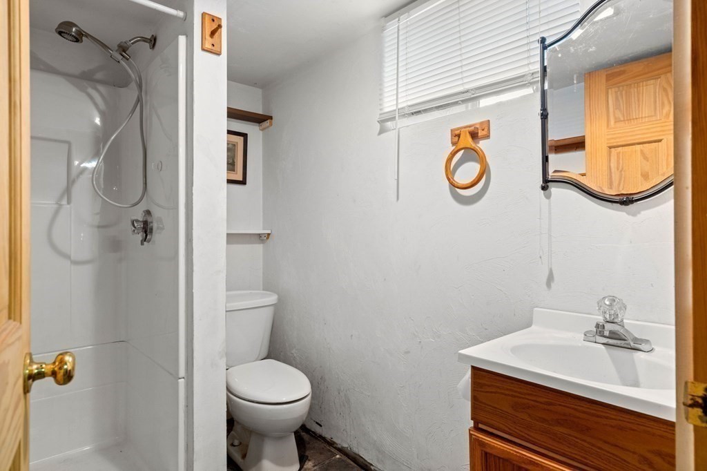 14 Fairview Avenue Peabody, MA 01960 - Photo 31 of 37 a bathroom with a toilet sink and shower