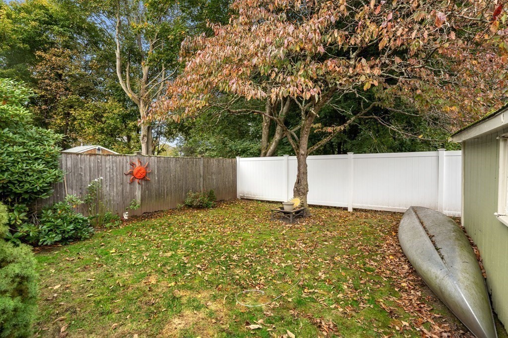 14 Fairview Avenue Peabody, MA 01960 - Photo 7 of 37 a backyard of a house with a tree and swing