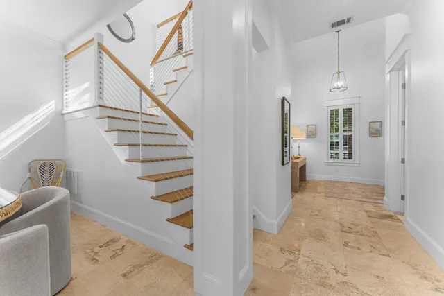 a bedroom with a bed and a television