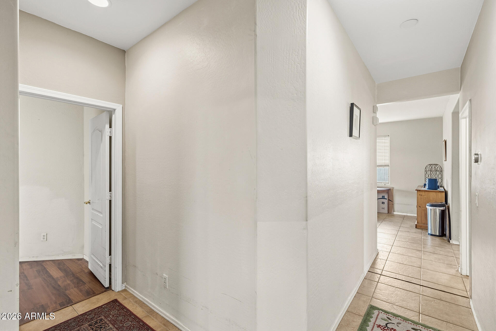 6718 West Darrel Road Laveen, AZ 85339 - Photo 20 of 49 a view of a bedroom from a hallway