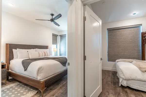 a view of a street with a building in the background