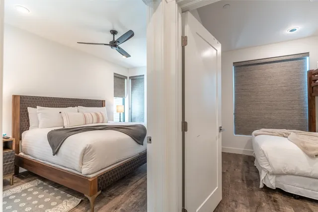 a view of a street with a building in the background