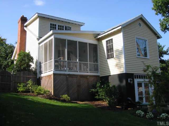 802 Brooklyn Street Raleigh, NC 27605 - Photo 1 of 1 COTTAGE FRONT YARD YIELDS AN EXPANSIVE, FENCED AND LANDSCAPED BACK YARD.
