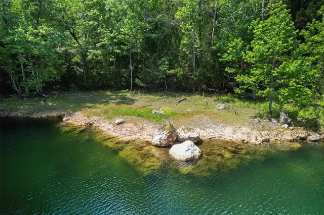 a view of a window and a lake