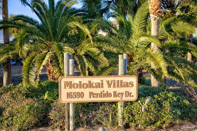 a sign on the side of a road