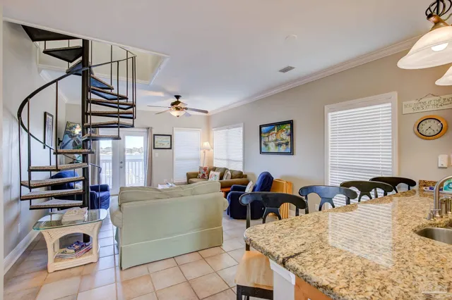 a view of a living room and workspace