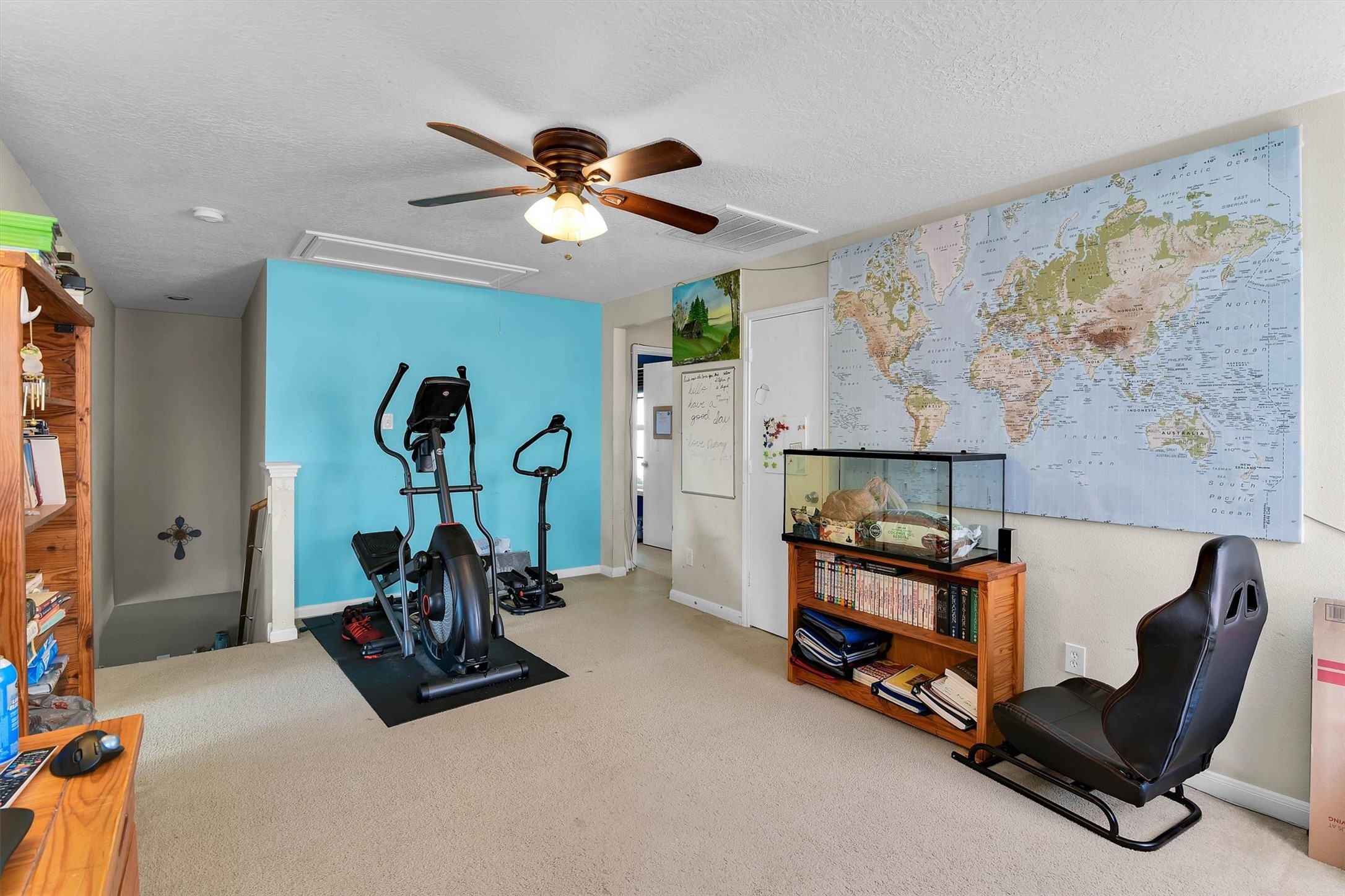 3003 Legends York Drive Spring, TX 77386 - Photo 17 of 29 a living room with furniture and a chandelier