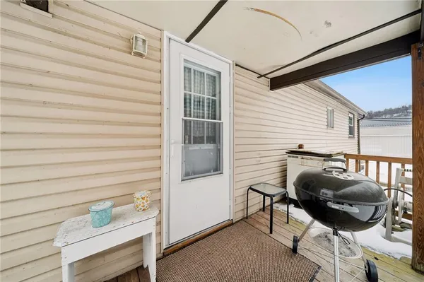 a view of a chair and fire pit