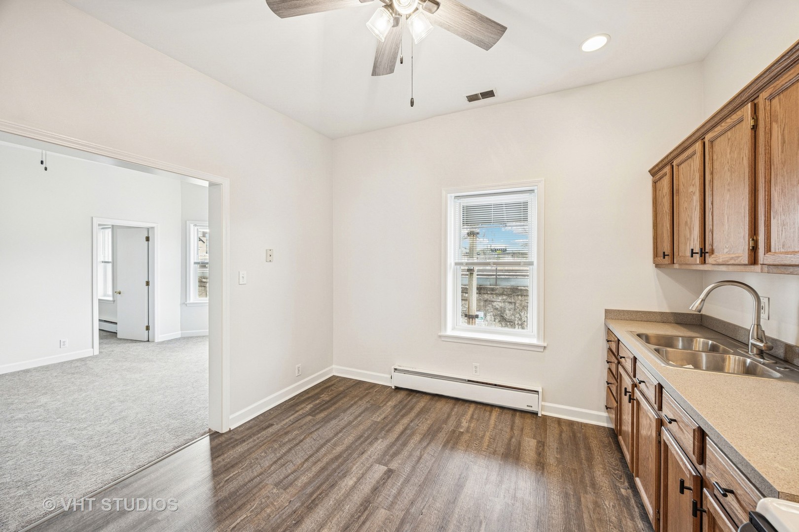 816 North Boulevard, Unit 2F Oak Park, IL 60301 - Photo 13 of 20 a view of a kitchen cabinets a sink and wooden floor