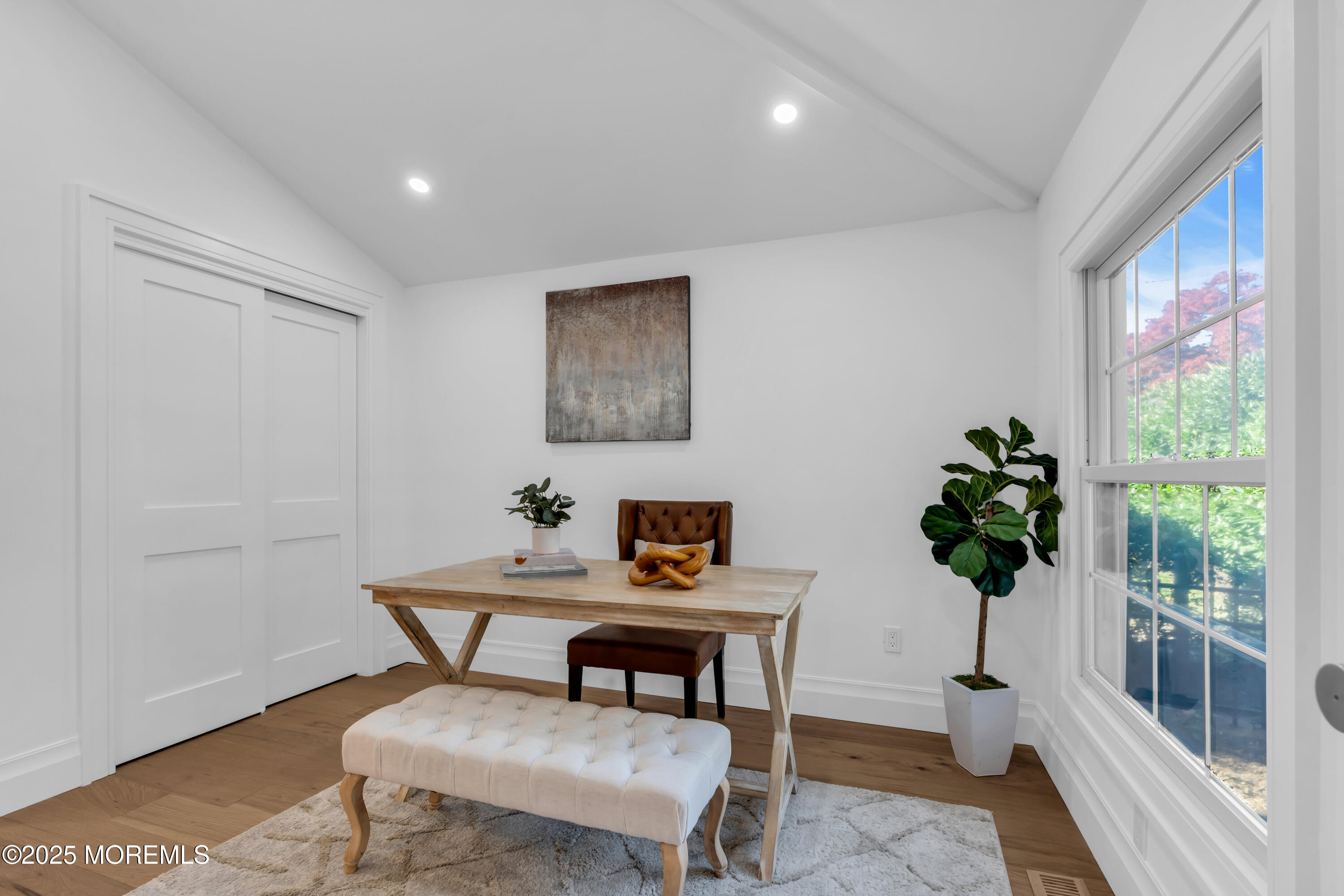 340 River Road Fair Haven, NJ 07704 - Photo 15 of 35 a view of a livingroom with furniture and a potted plant