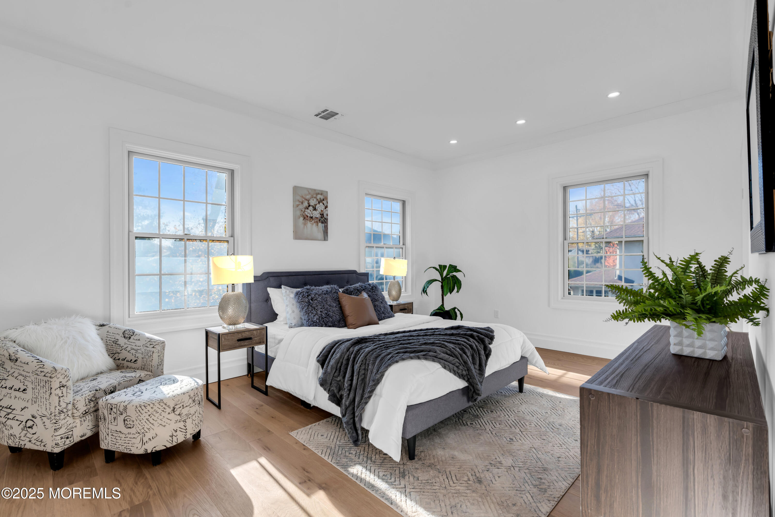 340 River Road Fair Haven, NJ 07704 - Photo 17 of 35 a bedroom with a bed and a couch