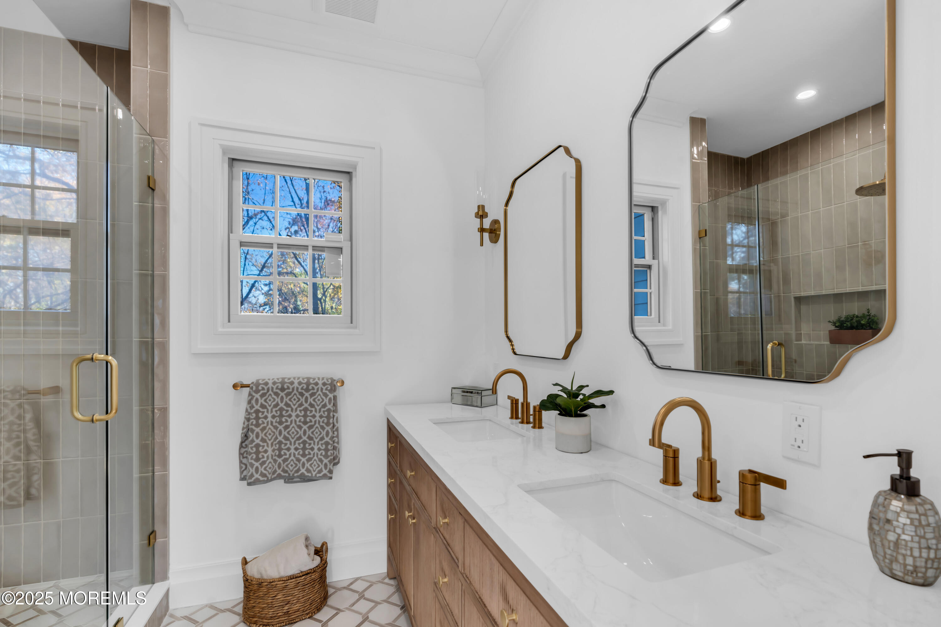 340 River Road Fair Haven, NJ 07704 - Photo 19 of 35 a bathroom with double vanity sink and a mirror