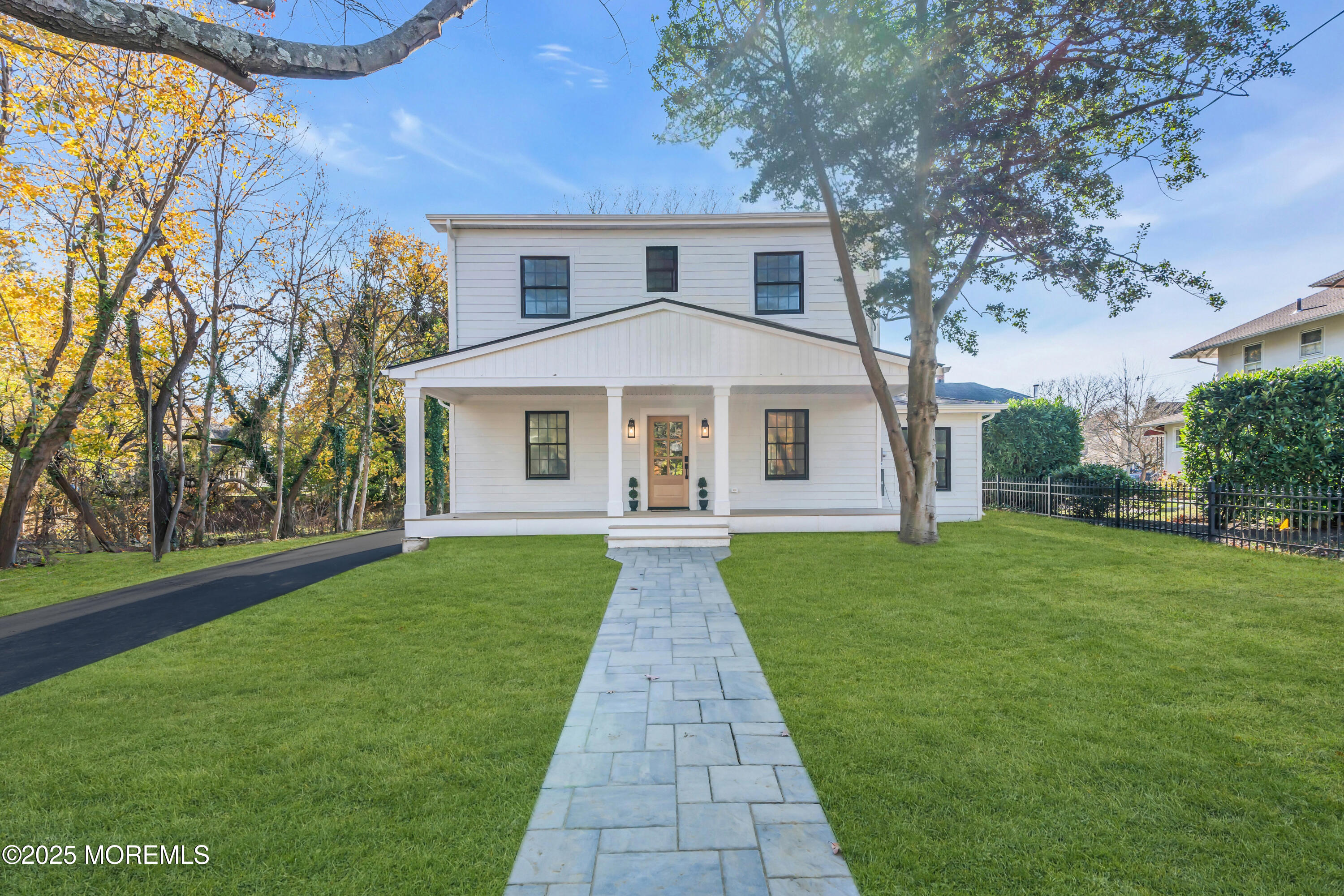 340 River Road Fair Haven, NJ 07704 - Photo 2 of 35 front view of a house and a yard