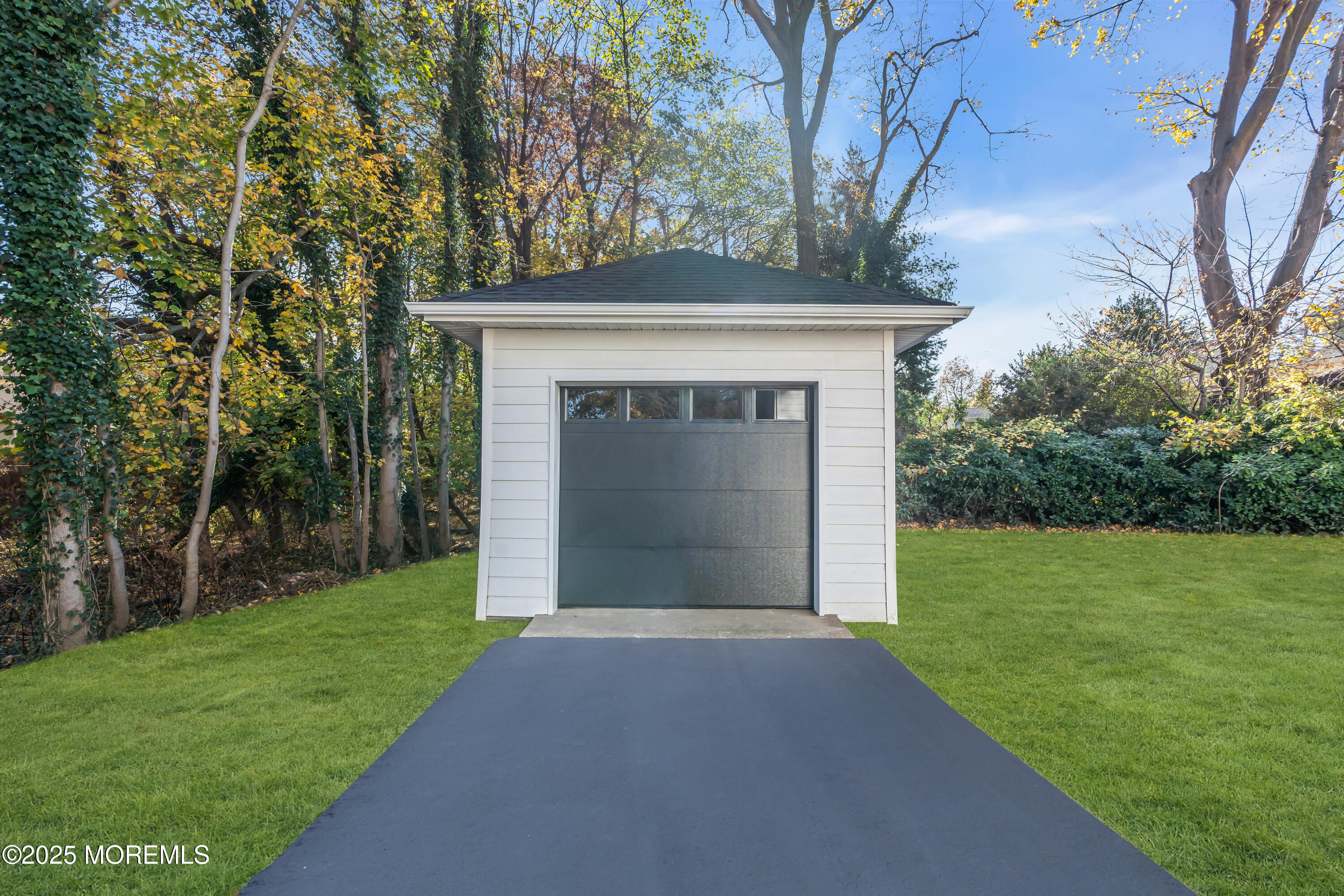 340 River Road Fair Haven, NJ 07704 - Photo 23 of 35 a view of an house with backyard and garden