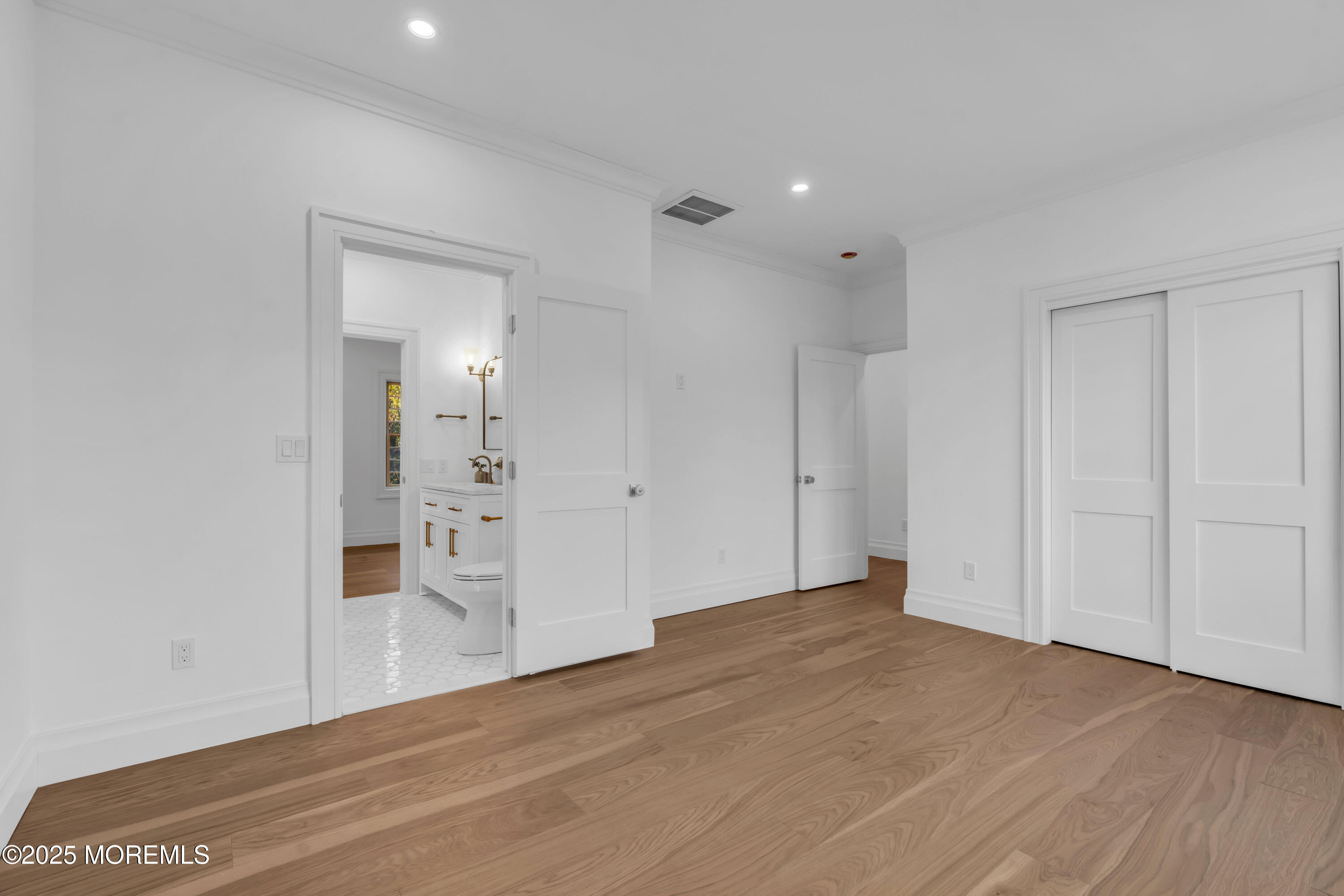 340 River Road Fair Haven, NJ 07704 - Photo 28 of 35 a view of a big room with wooden floor and windows